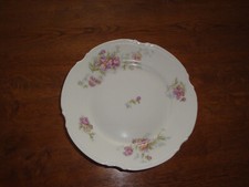 Plat à gâteau de présentation en porcelaine de Limoges décor floral