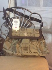 Deluxe Shoulder Bag, Designed