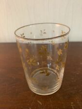 Verre à whisky doré fleur de lys en cristal Baccarat ?