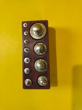 boite 11 poids en laiton de 1grs a 200 grs