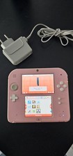 Console Nintendo 2DS rose avec chargeur / sans stylet , fonctionnelle .