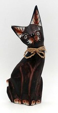 Chat marron en bois sculpté