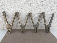 4 anciennes pinces en laiton /