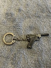 1 Porte clé schick pistolet