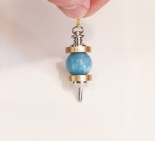 ° PENDULE MICRO VIBRATOIRE