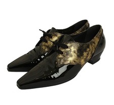 CHANEL Derbies en cuir verni