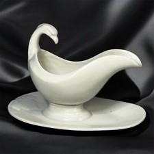 Grande Saucière ancienne en porcelaine décor de tête d'Aigle XIXème