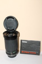 Zoom Vivitar 28-210 mm Macro Minolta MD + 2 bouchons