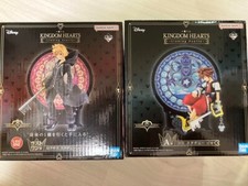 Lot de 2 figurines statue