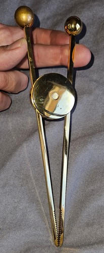 Pince sucre moderniste - à,