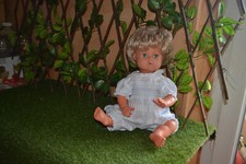 poupon petitcollin cheveux blond 50 cm je pense que c'est arnaud apres recherche