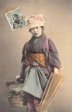 Japan - Geisha - Woman with a closed umbrella