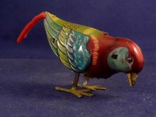 Ancien jouet tôle oiseau