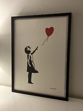 lithographie banksy avec certificat et encadrée 