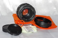 Objectif Exa 50mm f1,8 Meyer-Optik ORESTON, bouchons, pare-soleil et housse TBE