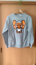 A BATHING APE Baby Milo KAWS