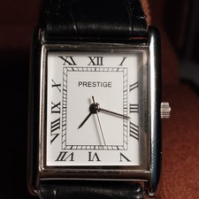 Montre  homme Prestige  forme Tank  pile incluse chiffres romains