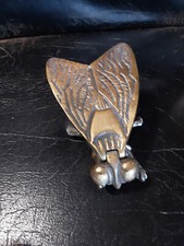 mouche en laiton peux etre