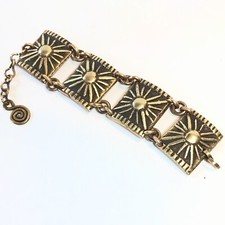 MICHEL BUFFET  Bracelet en bronze  soleil rayonant signé vintage