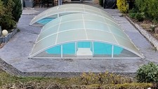 abris piscine de marque Abrideal pour une piscine de 9 x 4.50