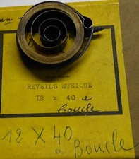 1 RESSORT REVEIL MUSICAL HAUTEUR 12 X DIAM. 40  