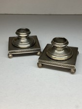 BOUGEOIRS SIGNÉS , EN BRONZE