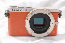 Appareil photo numérique sans miroir Panasonic LUMIX DMC-GM1 boîtier orange a...