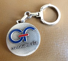 Ancien porte clé FIA Groupe. Métal émaillé.