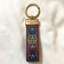 Porte-clés Louis Vuitton monogramme breloque Daruma MP1951 Italie or rouge au...