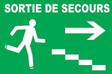 Panneau sortie de secours à droite avec escaliers