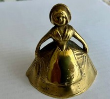 Ancienne petite cloche de table en bronze dame en costume et coiffe