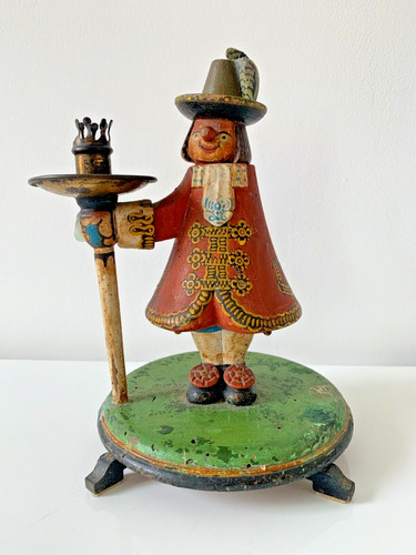 Ancien personage porte bougie