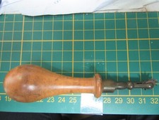 Molette de couture ancienne de cordonnier en métal et bois