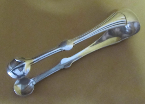 Petite pince sucre - à,