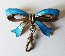 Broche noeud porte-montre en