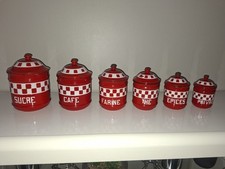 Série de 6 pots à épices en tôle émaillée blanche et rouge