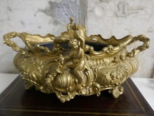 belle jardinière laiton doré aux puttis,P 2,2kg,L31x18cm