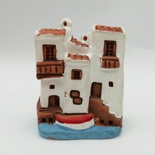 maison miniature en terre