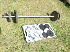 barre de musculation plus coffret et disques