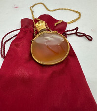 Nina Ricci flacon de sac chaine de cou pochette rouge, extrait "L'Air du Temps"