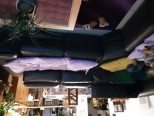 canapé d’angle 8 places dont 2  relax gris foncé bon état têtes amovibles 