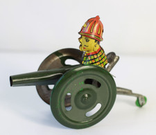 Jouet canon et pompier en