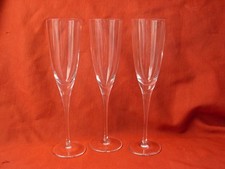 SEVRES,SERIE DE 3 FLUTES A CHAMPAGNE EN CRISTAL,SIGNEES, 22,5 CM,EPOQUE XXème.