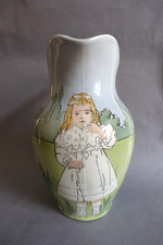 Broc en faïence à décor Art