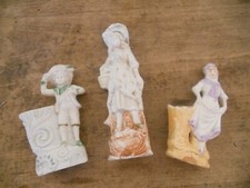 3 figurines personnages en