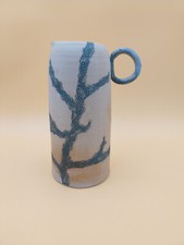 pichet en céramique signé