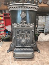 Poêle Godin 3726 ovale fonte anthracite sortie 125mm 5Kw buches 40cm