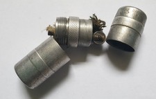 Ancien briquet circulaire de soldat à essence