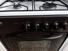 gazinière Faure du groupe Electrolux 3 brûleurs et 1 électrique, four électrique