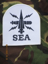 Royal Bleu Marine, Badge